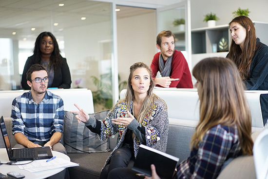 A group of people discussing a project